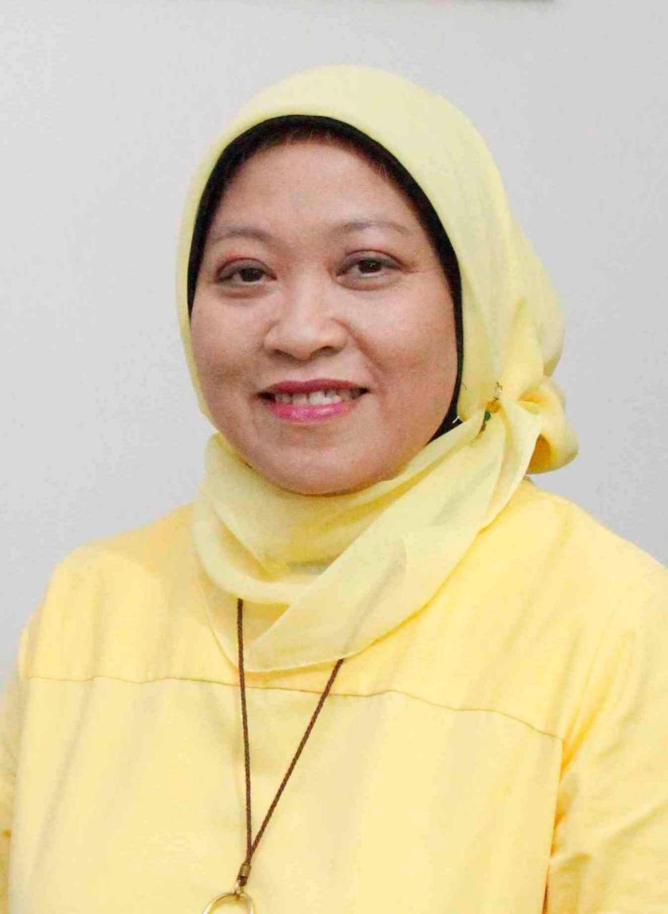 An Indonesian woman in a yellow head scarf and shirt